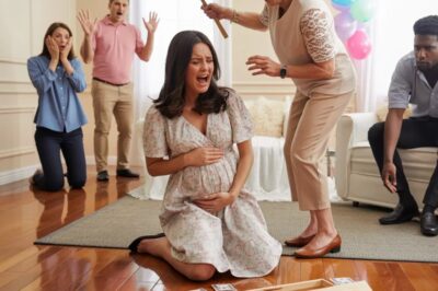 Estaba de ocho meses de embarazo, de pie bajo globos en tonos pastel, cuando mis amigas vitorearon: “Para ti… y para el bebé”. Alguien susurró: “Hemos reunido 49.000 dólares para tus facturas médicas”. Yo lloraba y me reía a la vez… hasta que vi cómo los ojos de mi madre se clavaban en la caja de donaciones. “Muévete”, soltó con brusquedad, alargando la mano para agarrarla. “Mamá, no… ¡eso no es tuyo!”, protesté. Su sonrisa se borró de golpe. Se inclinó detrás de la mesa, tiró de un adorno y sacó una pesada barra de hierro que formaba parte de la decoración. Con la voz baja y llena de veneno, siseó: “No te lo mereces”. Y entonces—CRAC. El golpe me impactó en el vientre. Sentí una oleada caliente y aterradora recorrerme el cuerpo… y, al instante, se me rompió la bolsa.